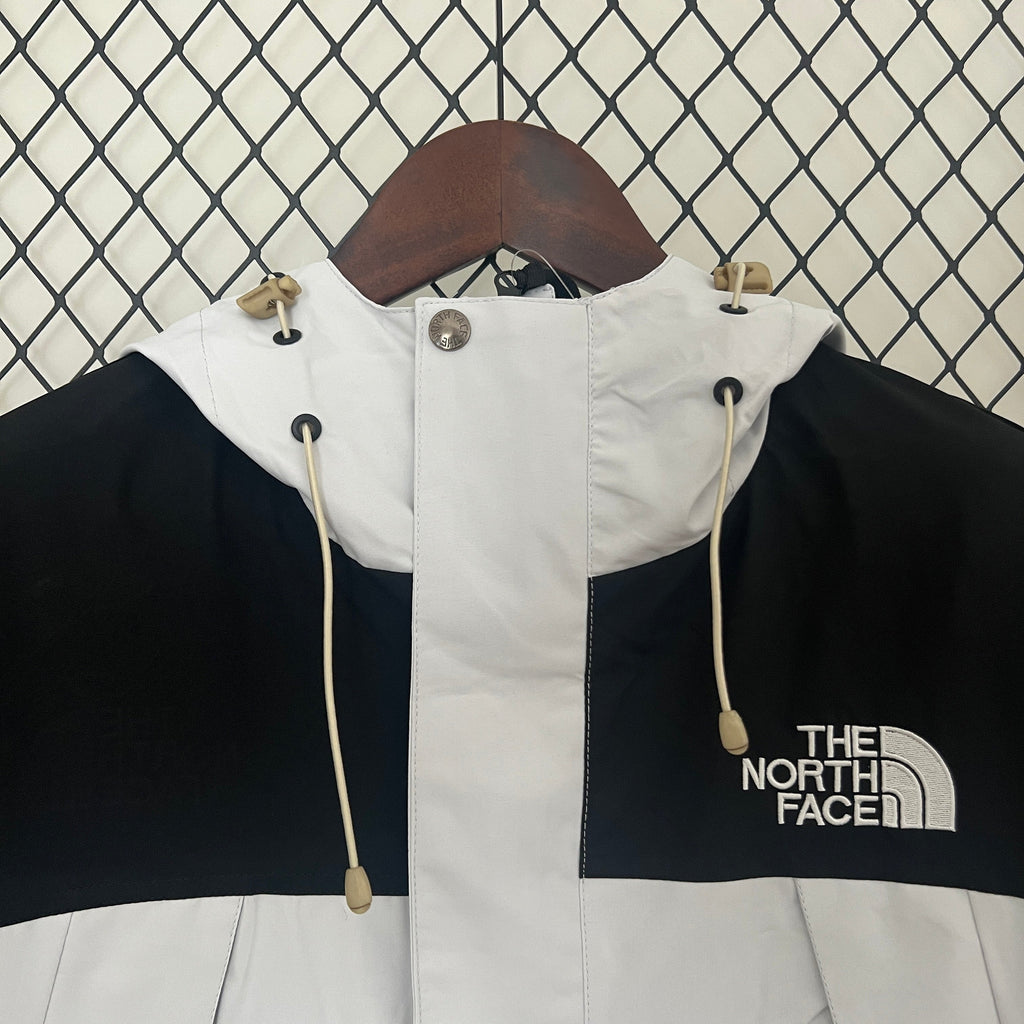 The North Face Windbreaker Weiß & Schwarz